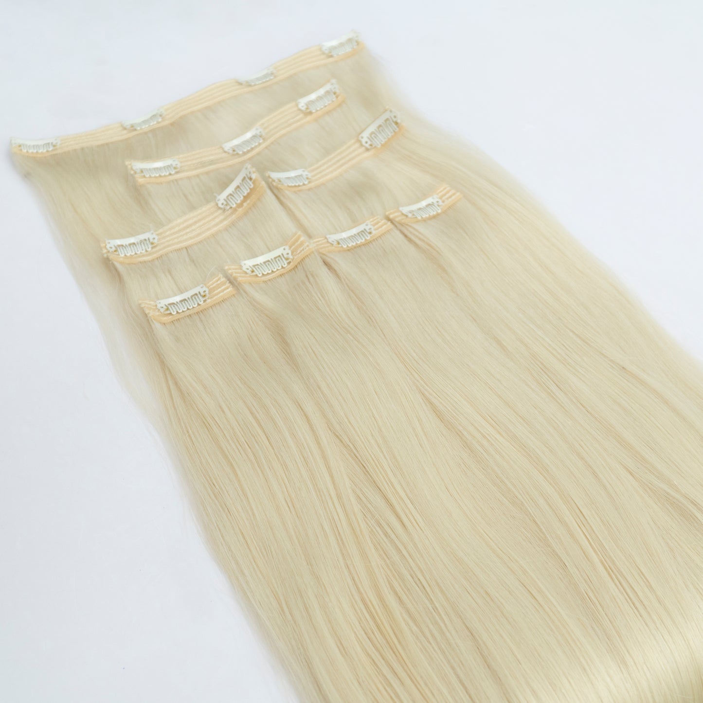 Extensii din păr rusesc Clip-On blond deschis