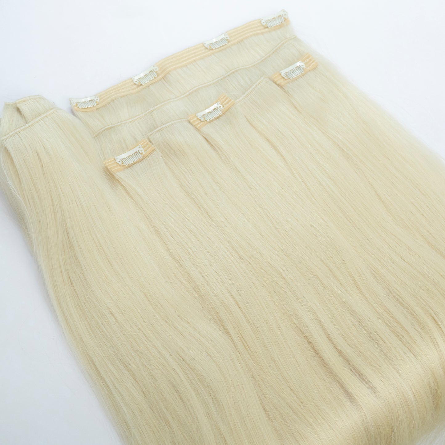 Extensii din păr rusesc Clip-On blond deschis