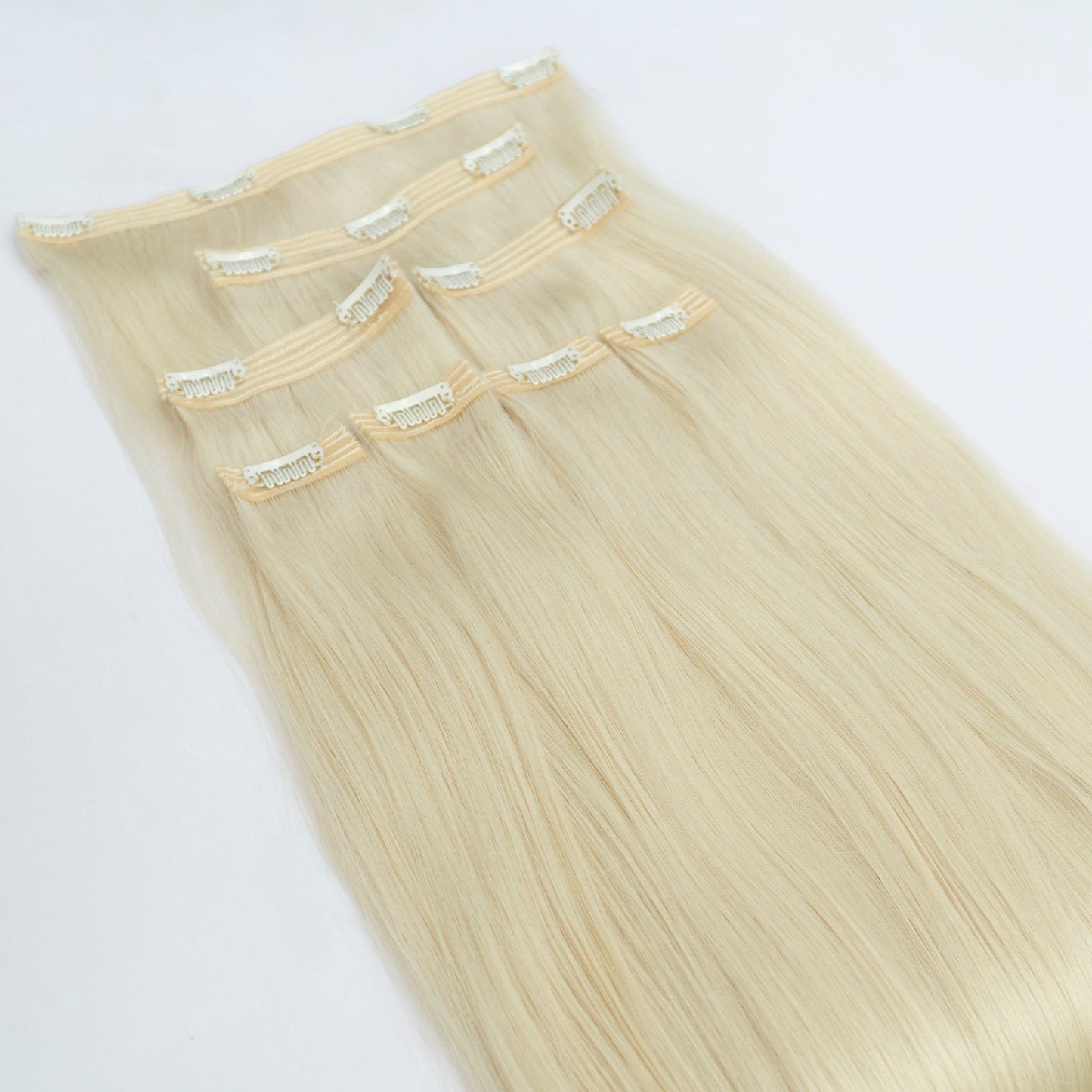 Extensii din păr rusesc Clip-On blond deschis