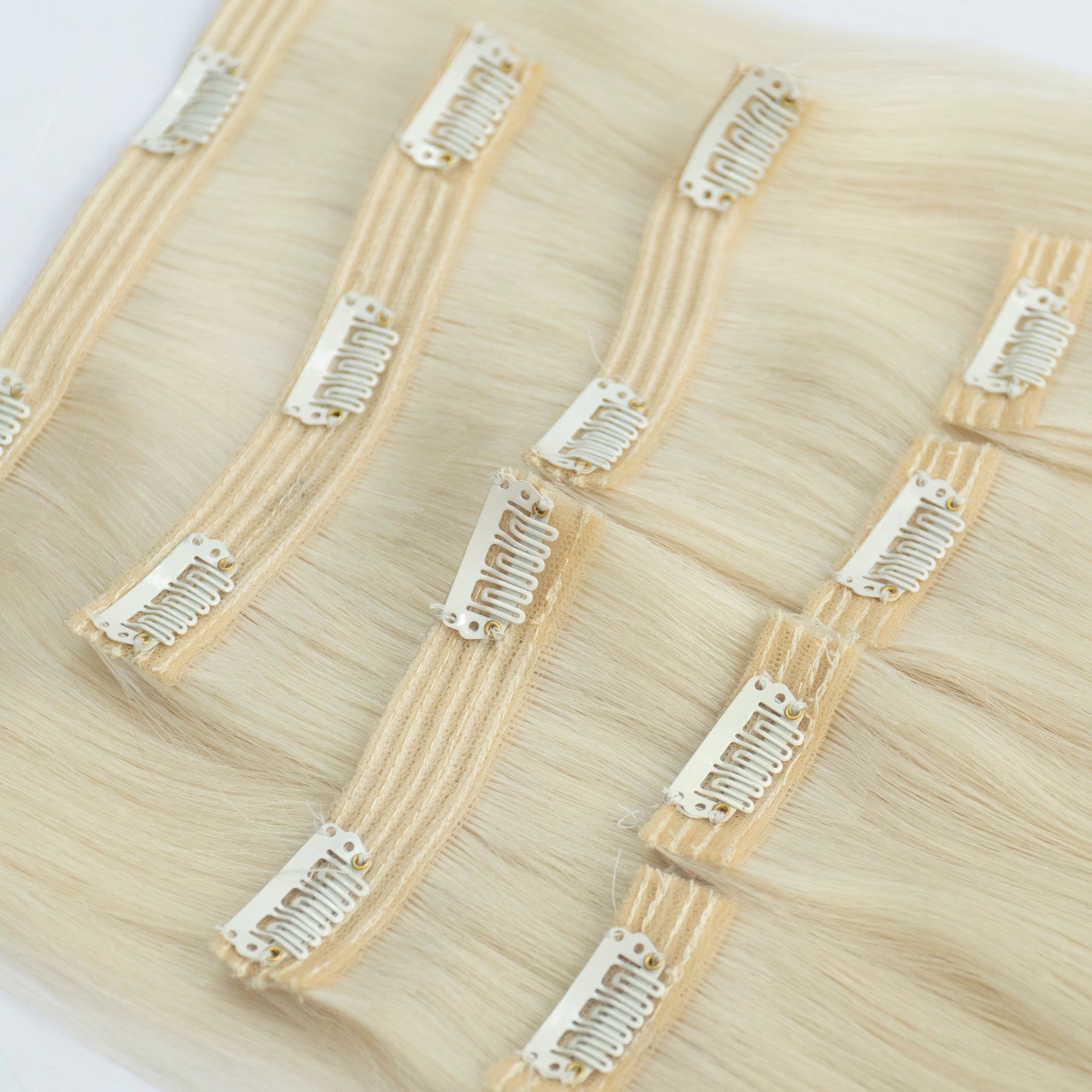 Extensii din păr rusesc Clip-On blond deschis